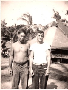 Jimmy Jewell, machinist mate (automobile) 1st class with his buddy in the 75th CB Battalion, Luzon, Philippines 1945.