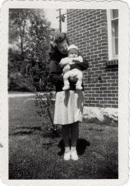 Aunt Colleen and a goofy kid outside 127 Castle Heights Avenue, Lebanon, TN, circa 1945